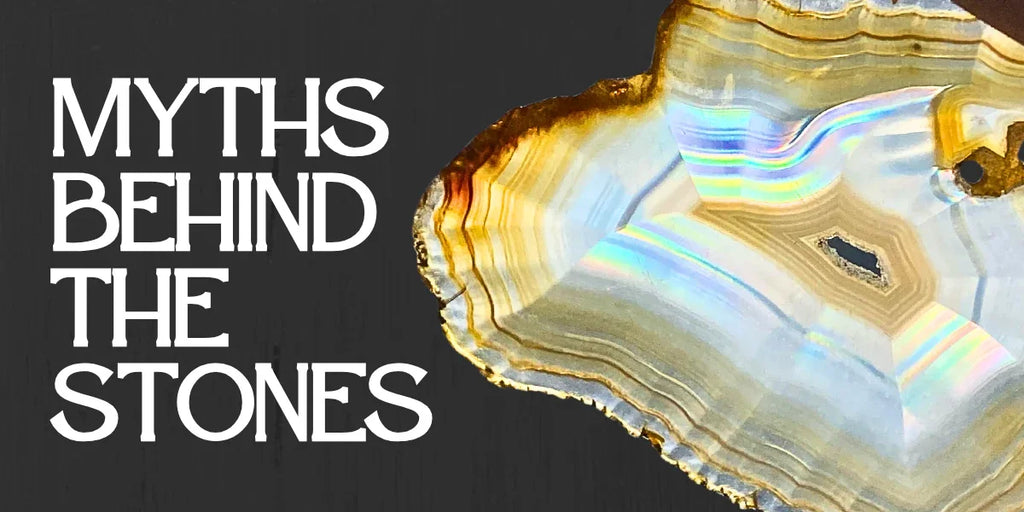 A polished slice of Agate with shimmering rainbow banding next to bold white text reading ‘Myths Behind the Stones’ on a dark wood background.