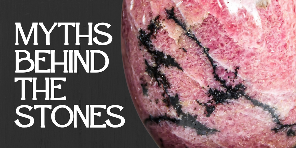 A polished piece of Rhodonite next to bold white text reading ‘Myths Behind the Stones’ on a dark wood background.