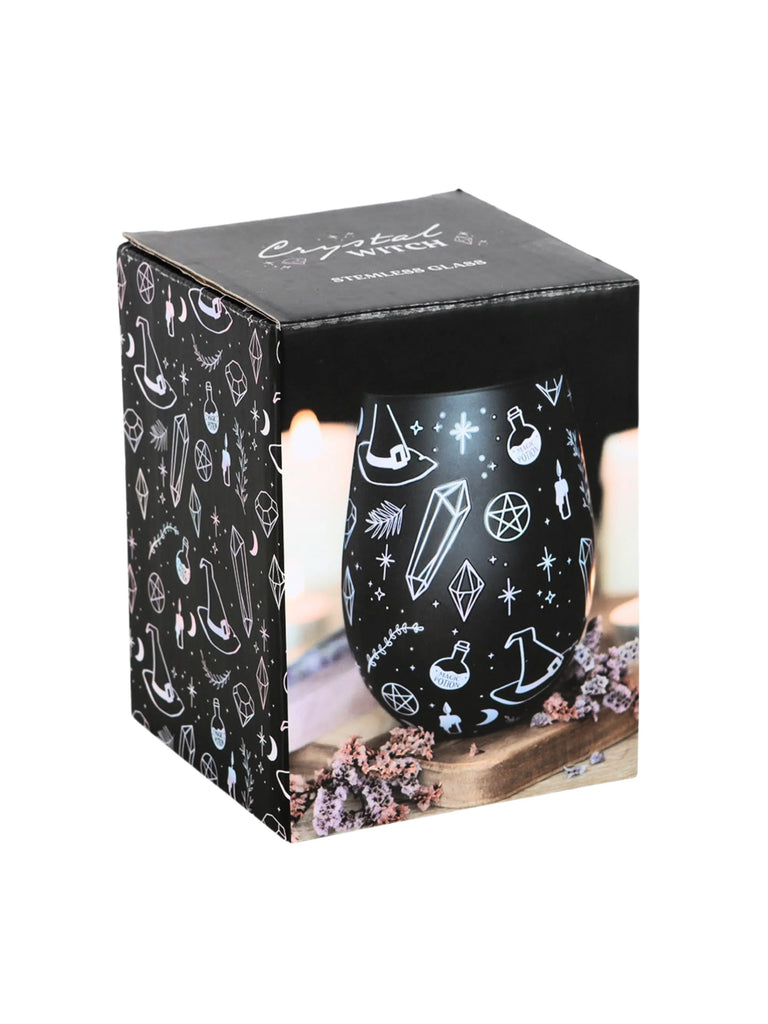 Black mug with white designs in a decorative box on a white background