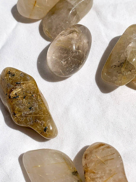 Golden Rutile in Quartz Tumbles | Medium - Unearthed Crystals