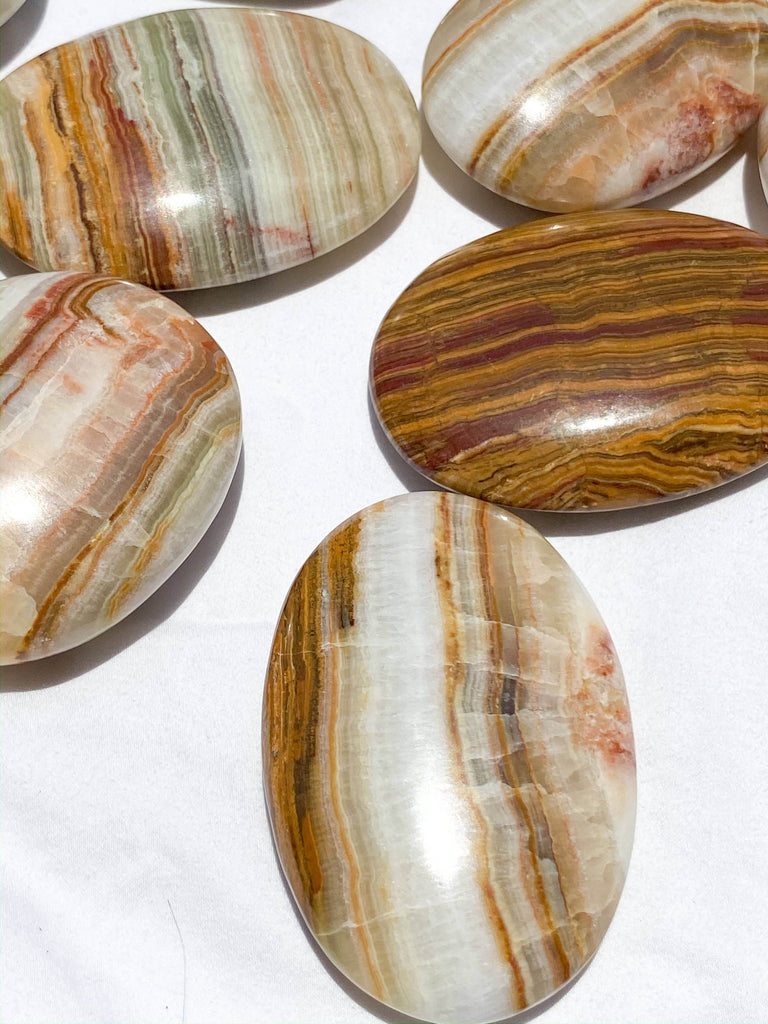 Banded Calcite Palm Stone | Large - Unearthed Crystals