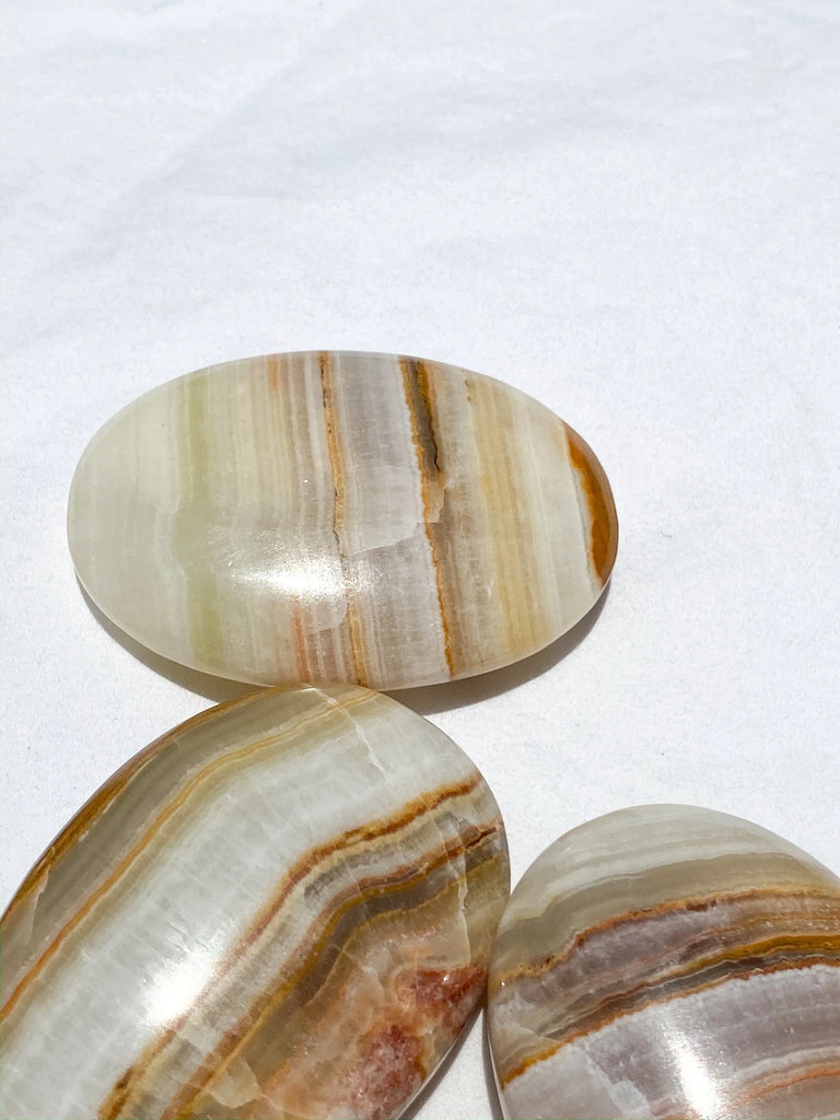 Banded Calcite Palm Stone | Large - Unearthed Crystals
