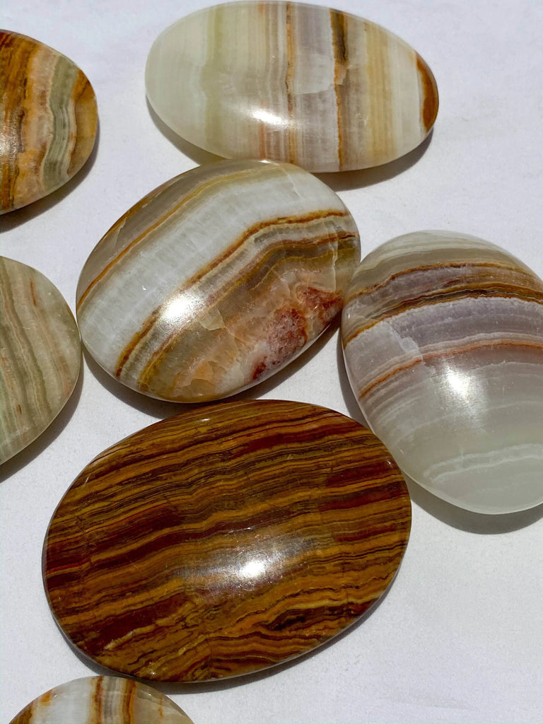 Banded Calcite Palm Stone | Large - Unearthed Crystals